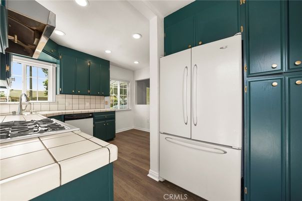 Interior, Kitchen, Recessed Lighting, Tile Countertops, Wood Texture Flooring
