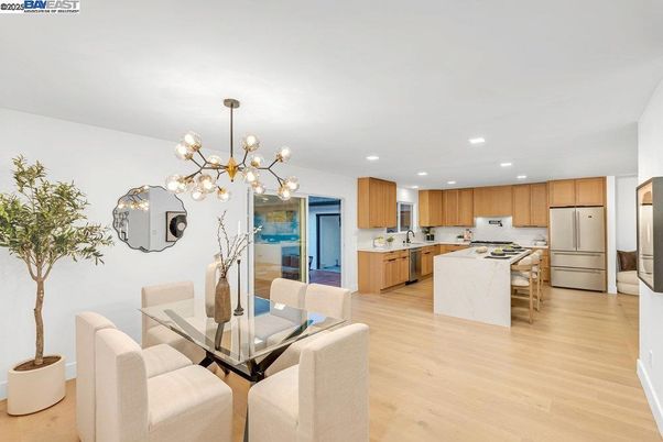 Dining room, Interior, Kitchen, Pendant Lights, Recessed Lighting, Stainless Steel Appliances, Wood Texture Flooring
