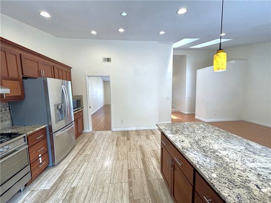 Interior, Kitchen, Pendant Lights, Recessed Lighting, Stainless Steel Appliances, Wood Texture Flooring