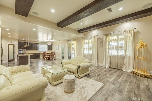 Dining room, Interior, Kitchen, Living room, Pendant Lights, Recessed Lighting, Stainless Steel Appliances, Wooden Beams, Wood Texture Flooring