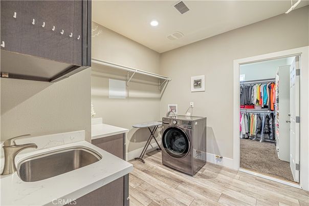 Interior, Recessed Lighting, Walk-in Closets, Washer, Wood Texture Flooring