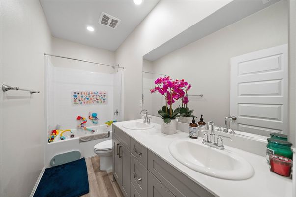 Bathroom, Dual Sink Vanities, Interior, Recessed Lighting, Wood Texture Flooring