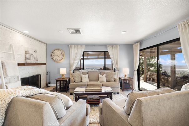 Fireplace, Interior, Living room, Recessed Lighting, Water, Wood Texture Flooring