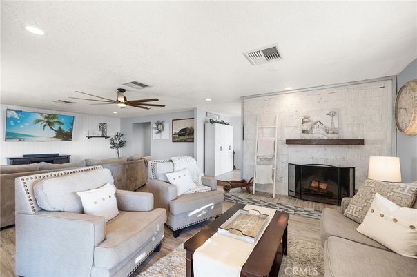 Fireplace, Interior, Living room, Recessed Lighting, Wood Texture Flooring
