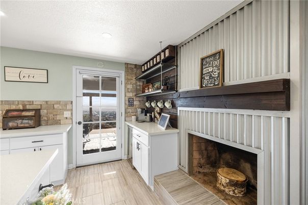 Fireplace, Interior, Recessed Lighting, Stone Walls, Wood Texture Flooring