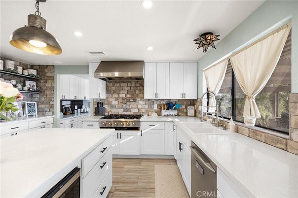 Interior, Kitchen, Pendant Lights, Recessed Lighting, Stainless Steel Appliances, Stone Walls