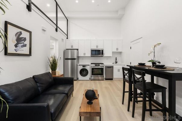 Dining room, Interior, Kitchen, Recessed Lighting, Stainless Steel Appliances, Wood Texture Flooring