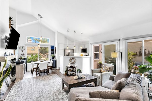 Dining room, Fireplace, Interior, Kitchen, Living room, Pendant Lights, Wood Texture Flooring