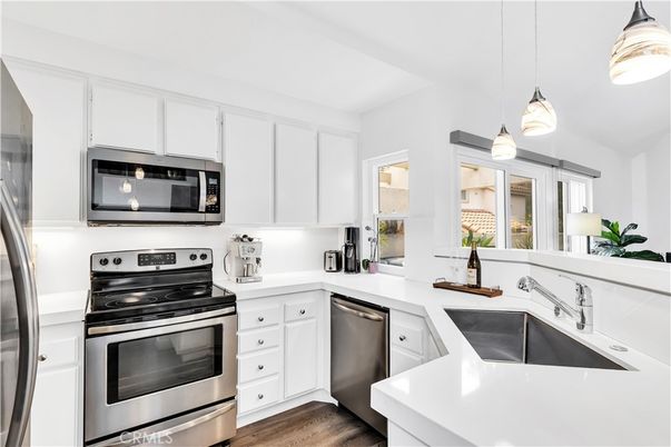 Interior, Kitchen, Pendant Lights, Stainless Steel Appliances, Wood Texture Flooring