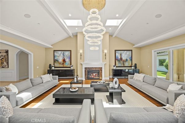 Chandelier, Fireplace, Interior, Living room, Recessed Lighting, Wood Texture Flooring