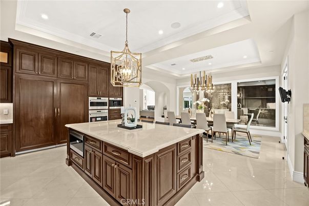 Chandelier, Dining room, Interior, Kitchen, Pendant Lights, Recessed Lighting, Stainless Steel Appliances