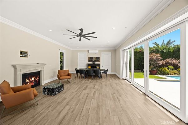 Dining room, Fireplace, Interior, Living room, Recessed Lighting, Wood Texture Flooring