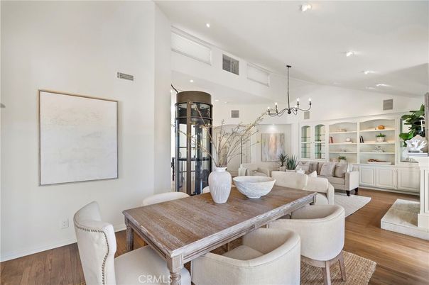 Chandelier, Dining room, Interior, Living room, Pendant Lights, Recessed Lighting, Wood Texture Flooring