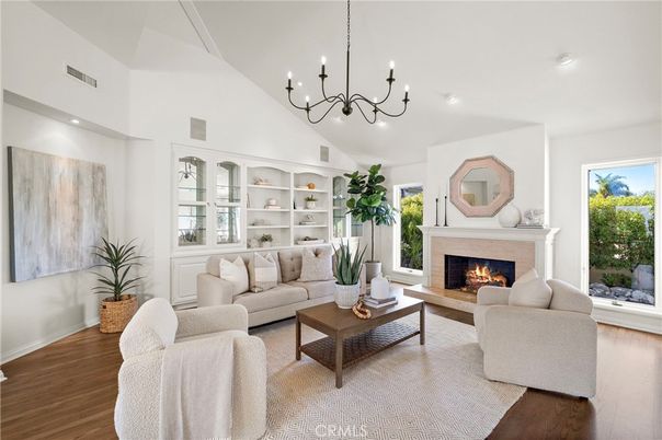 Chandelier, Fireplace, Interior, Living room, Recessed Lighting, Wood Texture Flooring