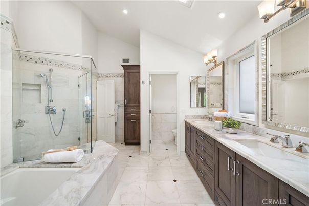 Bathroom, Dual Sink Vanities, Glass Shower, Interior, Marble, Marble Walls, Recessed Lighting