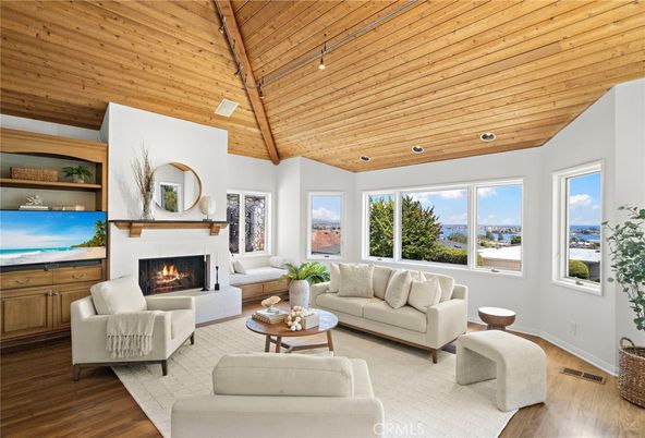Fireplace, Interior, Living room, Recessed Lighting, Water, Wooden Ceilings, Wood Texture Flooring