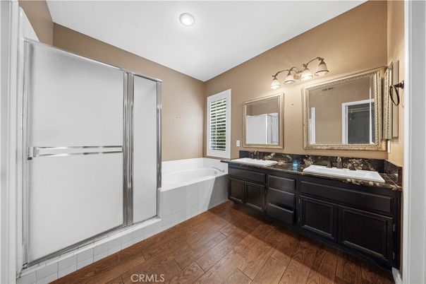 Bathroom, Dual Sink Vanities, Interior, Recessed Lighting, Wood Texture Flooring