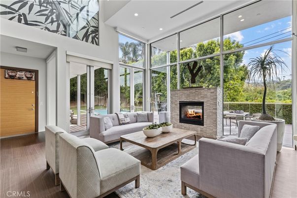 Fireplace, Interior, Living room, Recessed Lighting, Sun Room, Wood Texture Flooring