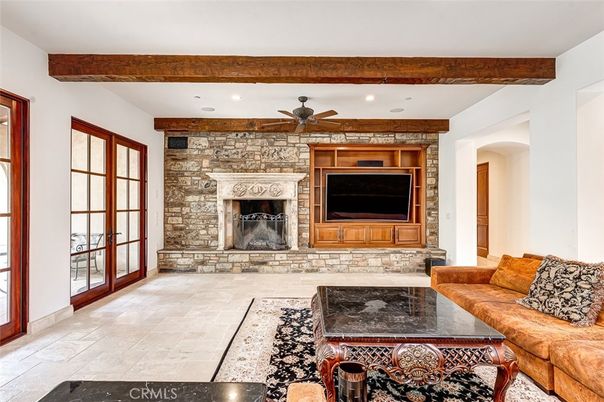 Fireplace, Interior, Living room, Recessed Lighting, Stone Walls, Wooden Beams