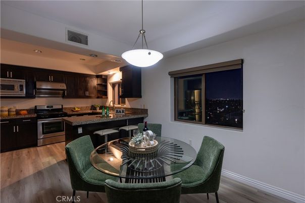 Dining room, Interior, Kitchen, Pendant Lights, Recessed Lighting, Stainless Steel Appliances, Wood Texture Flooring