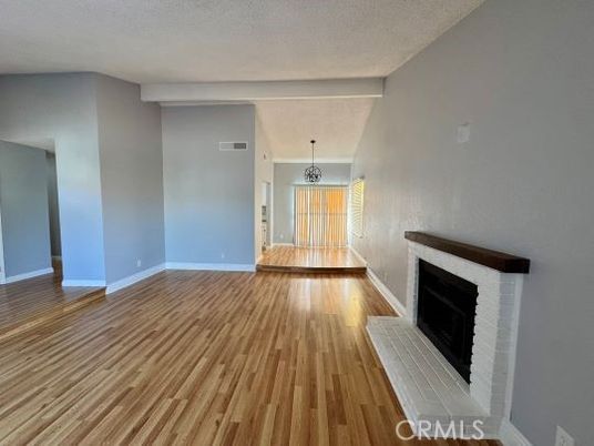 Chandelier, Empty room, Fireplace, Interior, Wood Texture Flooring