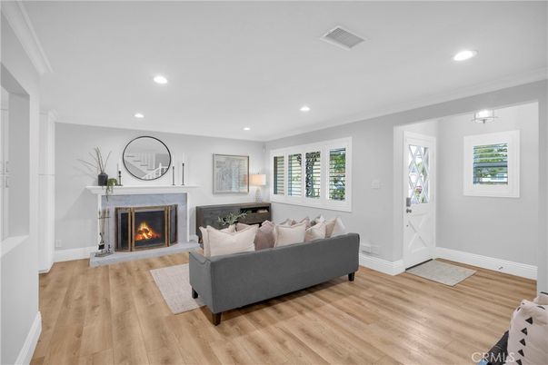 Fireplace, Interior, Living room, Recessed Lighting, Wood Texture Flooring