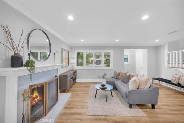 Fireplace, Interior, Living room, Recessed Lighting, Wood Texture Flooring