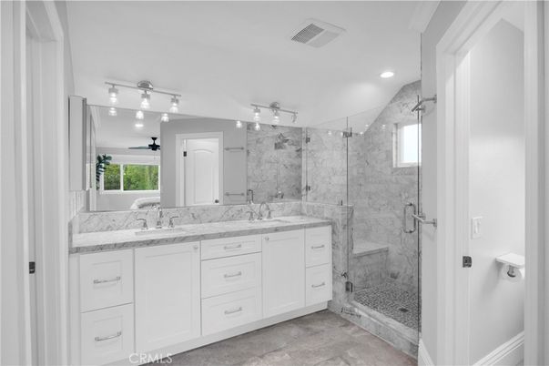 Bathroom, Dual Sink Vanities, Glass Shower, Interior, Marble Walls, Recessed Lighting