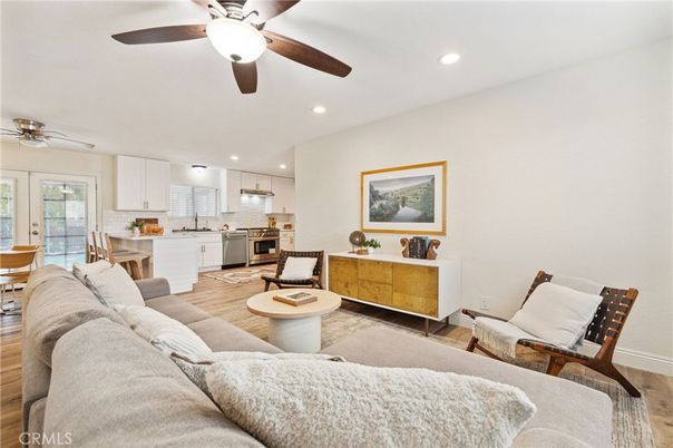 Dining room, Interior, Kitchen, Living room, Recessed Lighting, Stainless Steel Appliances, Wood Texture Flooring