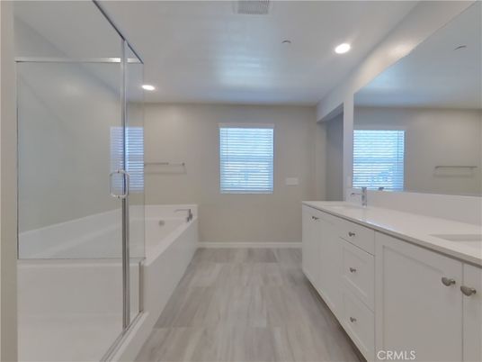 Bathroom, Dual Sink Vanities, Interior, Recessed Lighting, Wood Texture Flooring