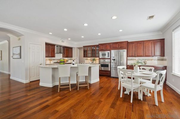Dining room, Interior, Kitchen, Recessed Lighting, Stainless Steel Appliances, Wood Texture Flooring