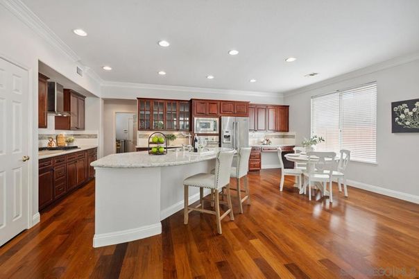 Dining room, Interior, Kitchen, Recessed Lighting, Stainless Steel Appliances, Wood Texture Flooring