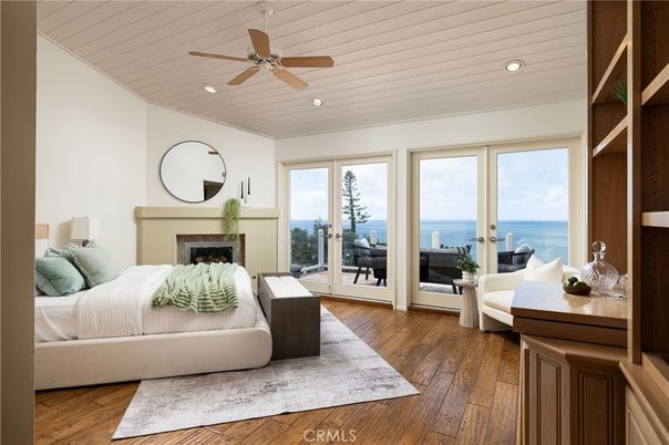 Bedroom, Fireplace, Interior, Recessed Lighting, Water, Wood Texture Flooring