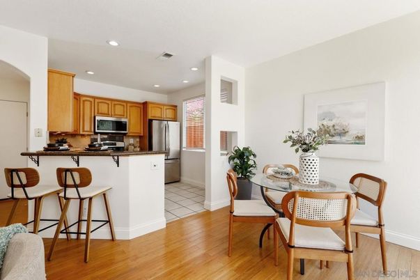 Dining room, Interior, Kitchen, Recessed Lighting, Stainless Steel Appliances, Wood Texture Flooring