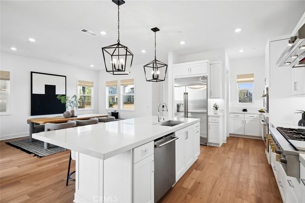 Interior, Kitchen, Pendant Lights, Recessed Lighting, Stainless Steel Appliances, Wood Texture Flooring