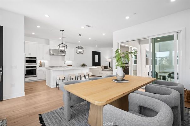 Dining room, Interior, Kitchen, Living room, Pendant Lights, Recessed Lighting, Stainless Steel Appliances, Wood Texture Flooring