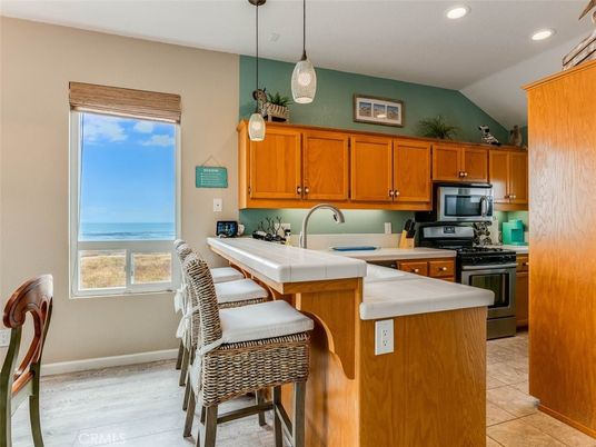 Interior, Kitchen, Pendant Lights, Recessed Lighting, Tile Countertops, Water, Wood Texture Flooring