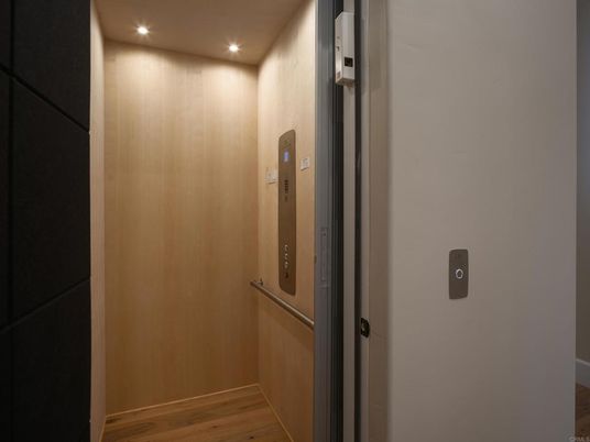 Elevator, Interior, Recessed Lighting, Wood Texture Flooring, Wooden Walls