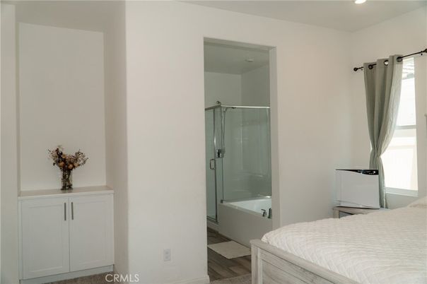 Bathroom, Bedroom, Glass Shower, Interior, Recessed Lighting, Wood Texture Flooring