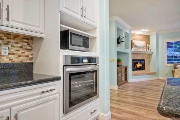 Fireplace, Interior, Kitchen, Recessed Lighting, Wood Texture Flooring