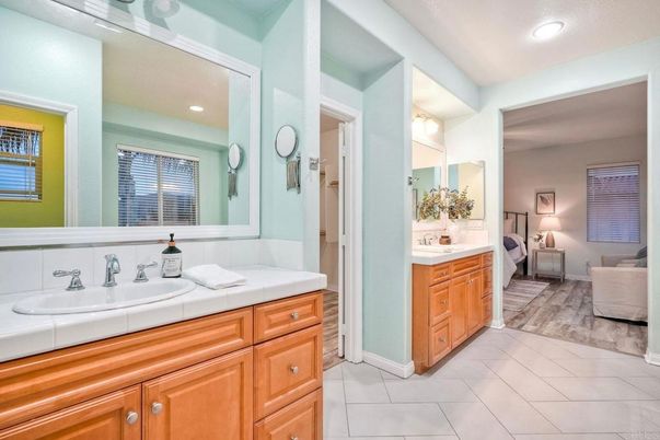 Bathroom, Bedroom, Dual Sink Vanities, Interior, Recessed Lighting, Tile Countertops, Wood Texture Flooring