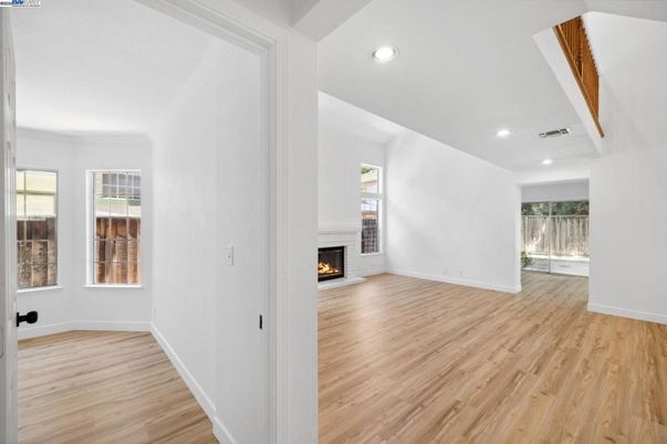 Empty room, Fireplace, Interior, Recessed Lighting, Wood Texture Flooring