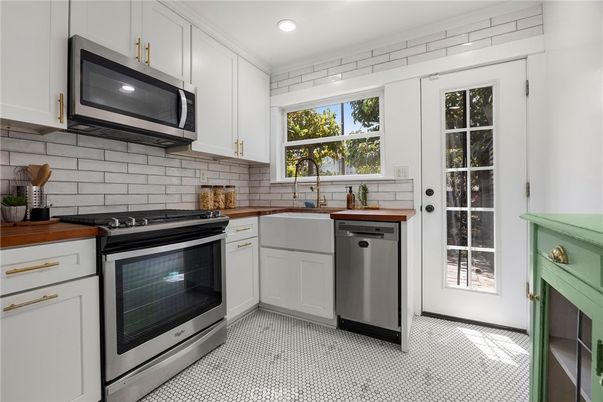 Fireplace, Interior, Kitchen, Recessed Lighting, Stainless Steel Appliances
