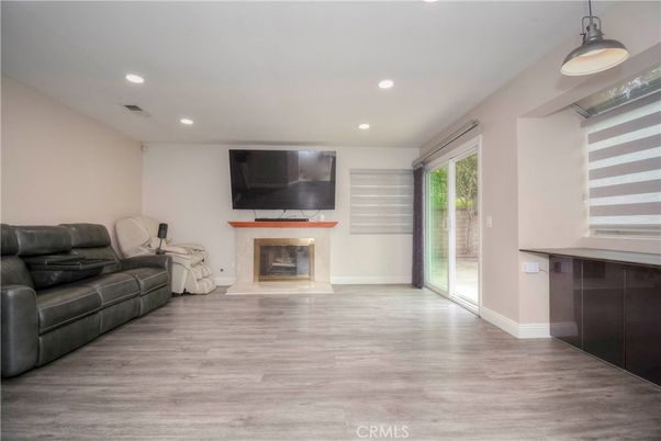 Fireplace, Interior, Pendant Lights, Recessed Lighting, Wood Texture Flooring