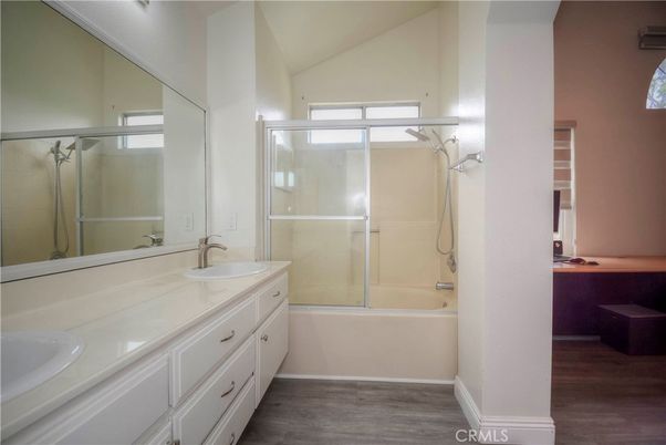 Bathroom, Dual Sink Vanities, Glass Shower, Interior, Wood Texture Flooring