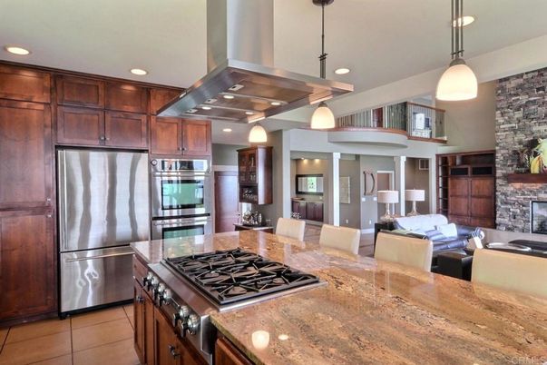 Dining room, Fireplace, Interior, Kitchen, Living room, Pendant Lights, Recessed Lighting, Stainless Steel Appliances, Stone Walls