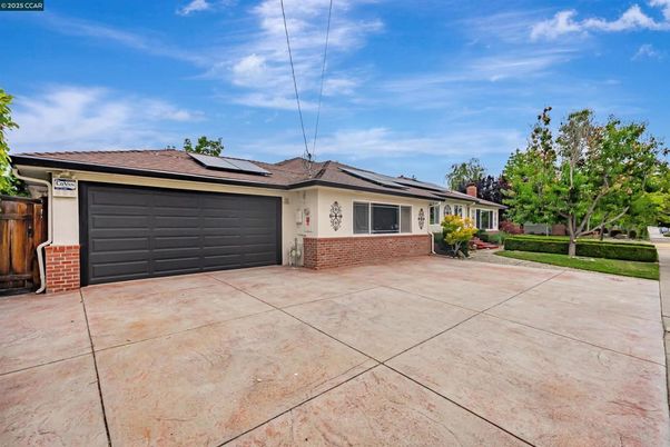 Attached, Exterior, Facade, Solar Panels, Ranch
