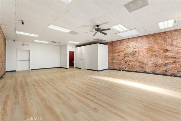 Empty room, Interior, Recessed Lighting, Stone Walls, Wood Texture Flooring