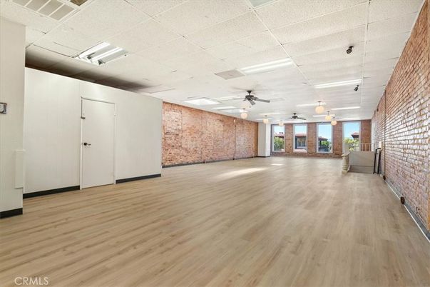 Empty room, Interior, Recessed Lighting, Stone Walls, Wood Texture Flooring