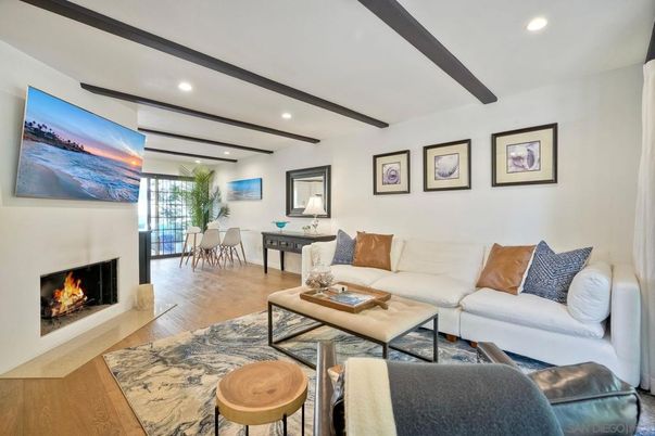 Dining room, Fireplace, Interior, Living room, Recessed Lighting, Wooden Beams, Wood Texture Flooring